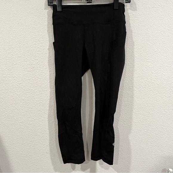 Lululemon black leggings size 4 with side leg pockets back pocket and panels - Picture 1 of 13